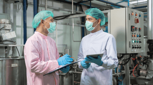 Workers manufacturing plant