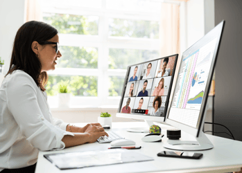 Woman on desktop computer