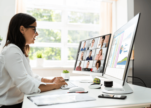 Woman on desktop computer