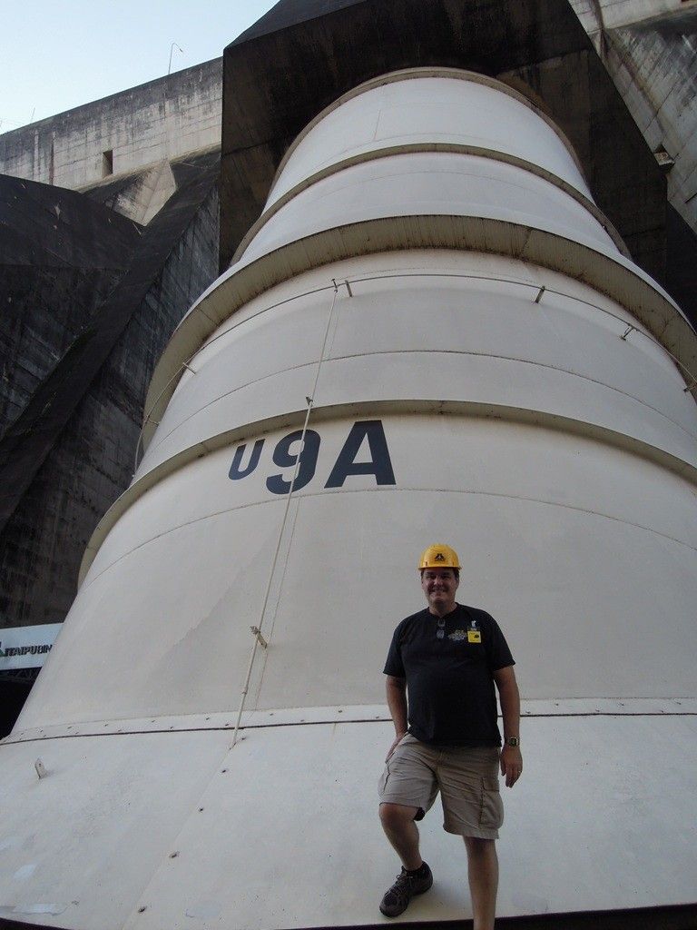 Trey Walters in front of one of the 10 m (33 ft) penstocks 