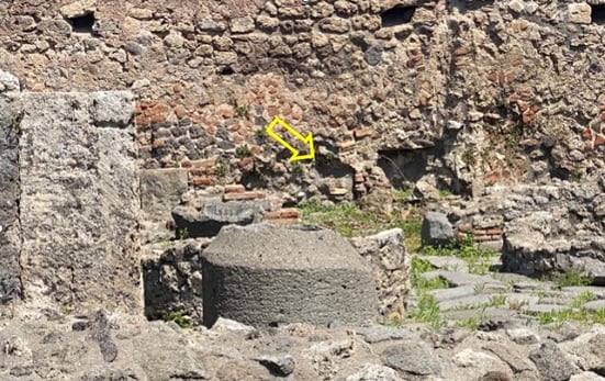 Figure 1a. A photo I took in Pompeii, Italy, on April 24 of a wall with a lead pipe protruding. 